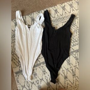Black and white zara body suits. Perfect condition. new without tags.